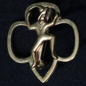 Pin: [Gold image of a man pin]