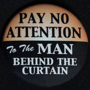 Button: "Pay no attention to the man behind the curtain"