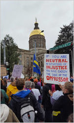 If You Are Neutral In Situations of Injustice, You Have Chosen the Side of the Oppressor sign, Atlanta March for Social Justice and Women, 2017-01-21