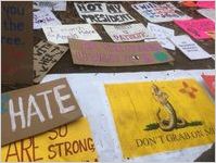 Not My President, I march for Amelia Malone R.I.P., Protest is Patriotic, Don't Grab On Me, My Daughter Deserves Better, and other signs, Women's March on Washington, 2017-01-21