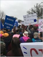 Crowd of protesters marching and carrying signs, Women's March on Washington, 2017-01-21