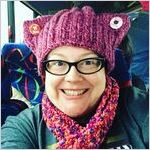 Kristina Graves on bus wearing "pussy hat," Women's March on Washington, 2017-01-21