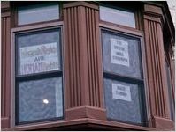 Window with protest signs, Women's March on Washington, 2017-01-21