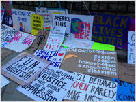Pile of signs, Women's March on Washington, 2017-01-21