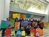 Group of Savannah marchers with Panhandle Slim signs, Women's March on Washington, 2017-01-21