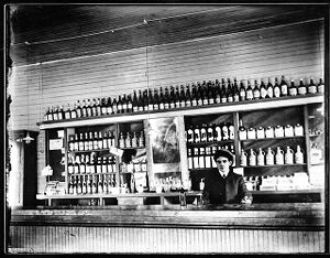 Bartender at bar in Glen Jean, West Virginia, circa 1910s