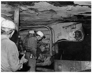 Lawrence S. Richmond, Section Forman, P. J. Halstead, General Inspector of Mines, and  Vergil Lemon, buggy operator, Armco Coal Resources No. 8 Mine, circa 1970s