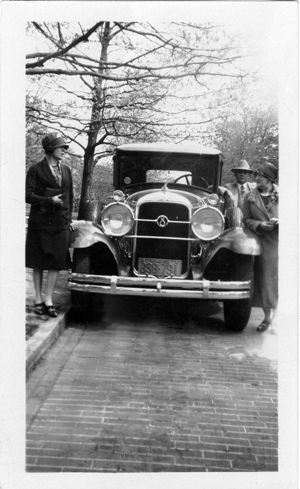 Van Bittner and family at car, circa 1920s