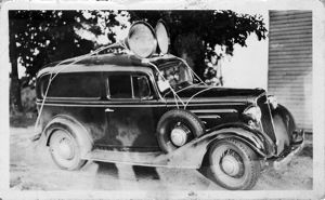 Automobile with amplifier and speakers, circa 1930s