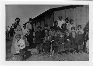 Children of coal miners outside communal barracks in West Virginia, circa 1930s