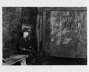 15-year old trapper boy earning 75 cents a day for 10 hours of work, 1908
