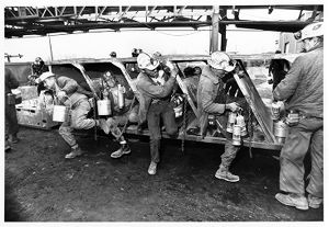 Miners deboarding a man trip, circa1970s