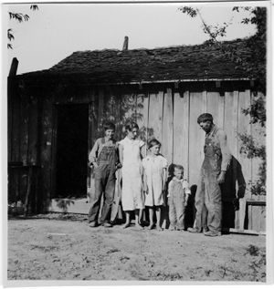Coal miner and children in Coal Creek, Tennessee, circa 1930s