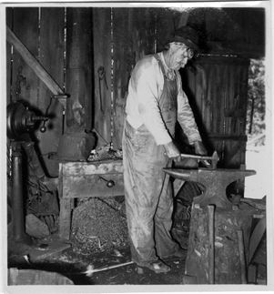 Coal miner blacksmithing in Coal Creek, Tennessee, circa 1930s