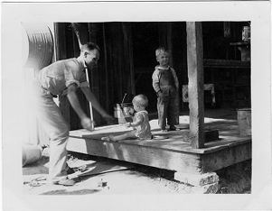 Coal miner with children at home in Coal Creek, Tennessee, circa 1930s