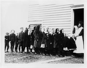Fatherless children at public soup kitchen following explosion in St. Paul Mining Company's Mine No. 2 in Cherry, Illinois, 1909-11-13