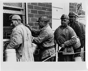 Coal miners at paymaster window on payday for Jonas and Laughlin Steel Corporation's Vesta No. 4 Mine near Vestaburg, Pennsylvania, 1954-01 