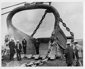 Group touring near a 78-yard bucket, circa 1970s