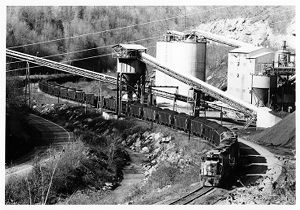 Chessie System coal hopper cars being loaded at Harris Mine tipple, circa 1960s