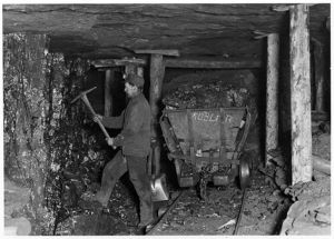 Coal miner in Rocky Mountain Fuel Company's Kubler Mine in Gunnison County, Colorado, 1913
