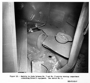 Mantrip in chute between No. 7 and No. 8 entries showing compartment containing Kornet's equipment, 1957-09-23