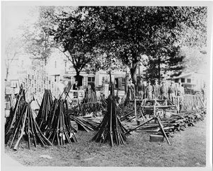 Firearms and ammunition on display in a coal town, circa 1920s
