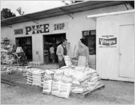 Pike Garden Shop with display of VitoGro Lawn Food (manufactured by Swift and Company)