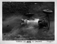 "Three WAS a Crowd," race car crack-up, Atlanta?, Georgia, 1950.
