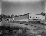 Under construction Evans Candy Company building, 1958
