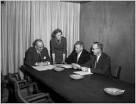 Commercial Trust Company bankers holding a meeting, 1960