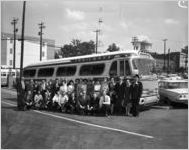 Guests arrive by bus for the Buster Brown Textile banquet, 1962