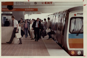 Passengers exit a MARTA train at the Airport station, May 29, 1990