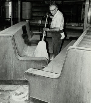 W.J. Purdie Jr. Cleans Bench Inside Terminal Station, July 22, 1971