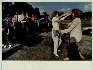 Dekalb Commissioner Sherry Sutton greets Cathy Bradshaw, president of CAUTION (Citizens against Unnecessary Thoroughfares in Older Neighborhoods), August 28, 1991