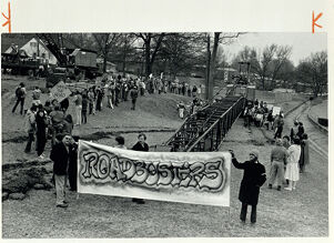 Presidential Parkway protesters surround a crane to stop construction, March 17, 1985