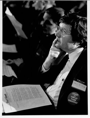 Gary R. Smith listens to presentations regarding the Presidential Parkway, undated