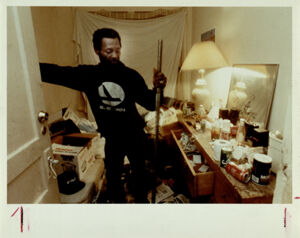 Atlanta Substandard Housing, Man in Cramped Living Spaces at Falcon Hotel, August 3, 1990