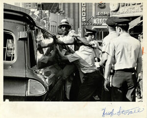 Atlanta Race Relations, African American Man Arrested by Police during Broad Street Riot, July 4, 1967