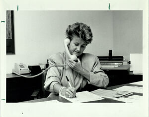 Phyliss Summers Talks on the Phone in Her Office, November 2, 1987