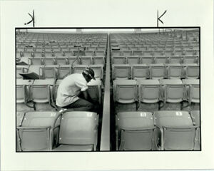 Harold Dozier replaces the last of the wooden seats in the Atlanta-Fulton County Stadium, August 11, 1987