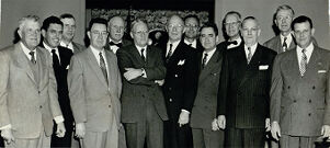 Mayor Hartsfield and a dozen of the 17 members of the new Aldermanic Board Pose after Discussing plans for the reorganization of the city government, December 21, 1953