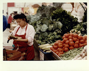 Atlanta Municipal Market, Vendor Inspects Produce, November 20, 1992