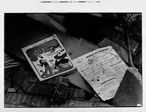 School books and debris from the Bowen Homes Day Care Explosion, October, 13 1980