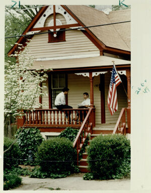 Kidd Cuevas and Andy Jones relex on their front porch, April 21, 1991
