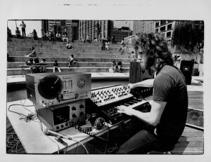 Geary Yelton plays music in Central City Park, September 4, 1980
