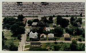 An aerial view of Summerhill with the Fulton County Stadium parking lot in the background, undated