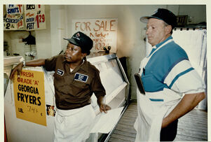 Sweet Auburn Curb Market stand owners George Cleave and Marshall Childers, undated