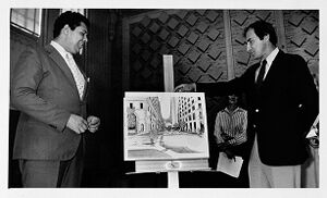 Mayor Maynard Jackson and Larry Fonts with a rendering of the Fairlie-Poplar project, undated