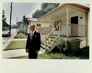 Rev. CottRell is Standing in Front of a Few of the Hope Homes on Lester St. Near Vine St. in Vine City