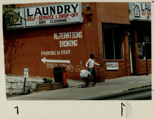 Man looking for cans to recycle on Ponce de Leon Avenue, September 5, 1990